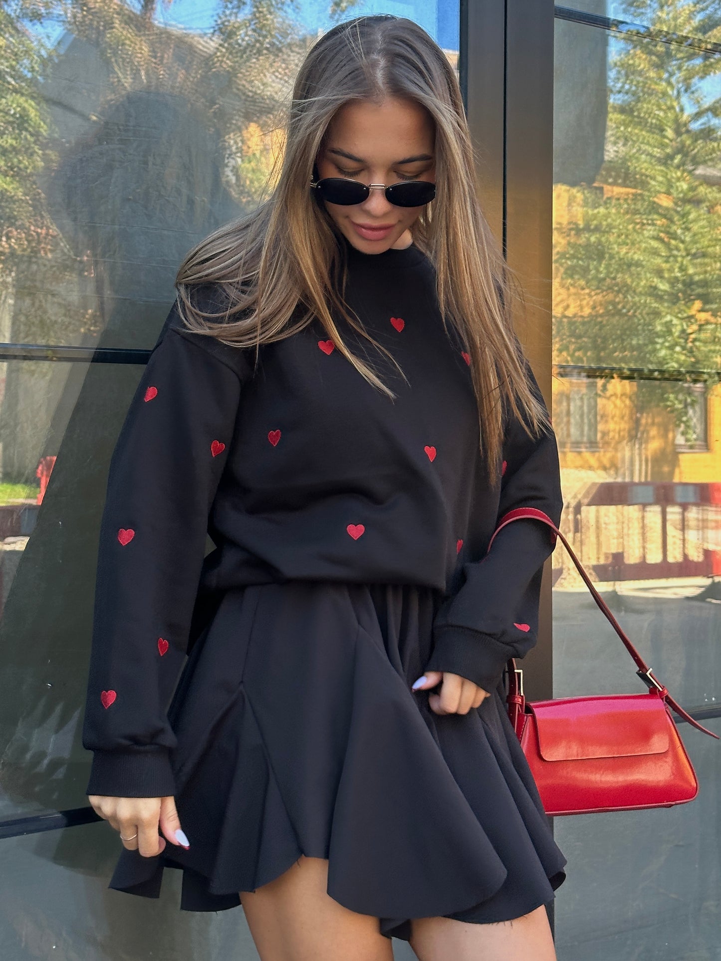 BLACK SWEATSHIRT WITH RED HEARTS